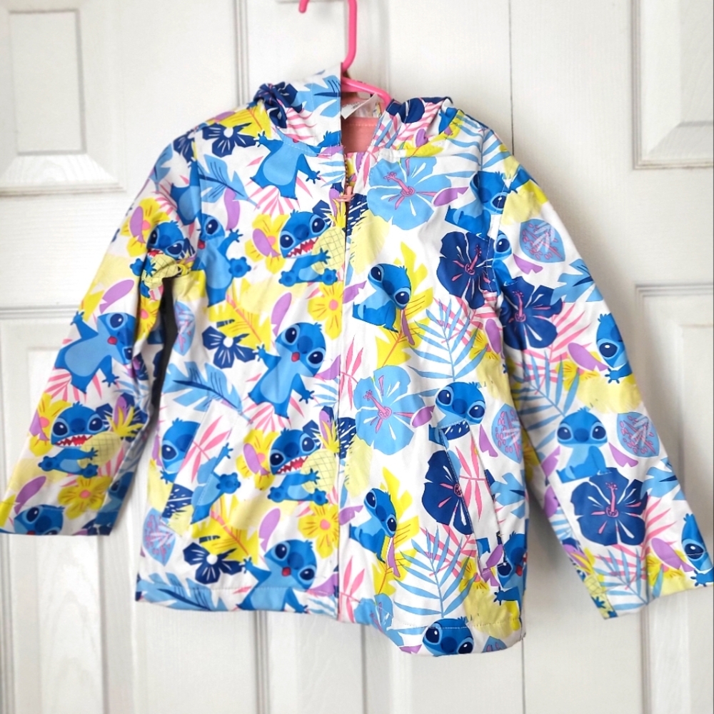 Flannel lined kids rain hooded slick rain jacket.